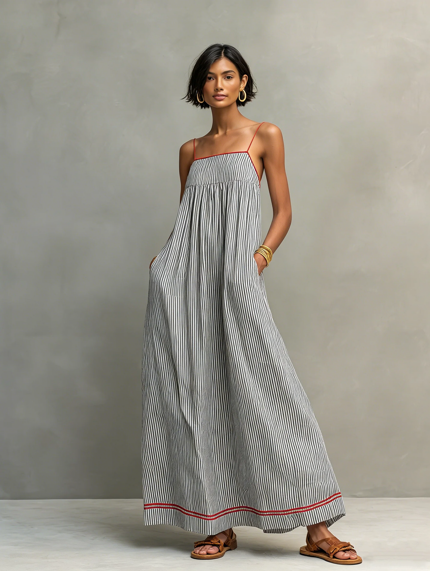 Rosse - Vestito lungo minimalista da donna a righe con dettagli rossi e spalline sottili.