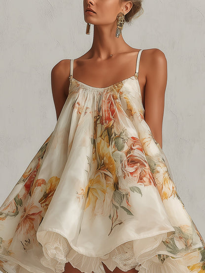 Valentina - Miniabito svasato in organza beige a fiori con rifiniture in pizzo