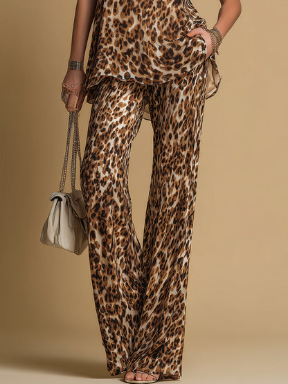 Fintia - Completo elegante con top in chiffon senza maniche stampa leopardo e pantaloni