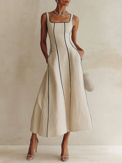 Giulia - Maxi abito svasato color albicocca a righe nere, stile minimalista