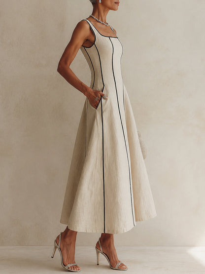 Giulia - Maxi abito svasato color albicocca a righe nere, stile minimalista