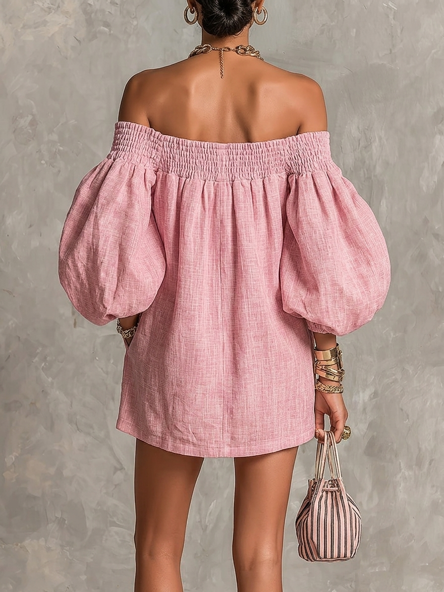 Livia - Miniabito rosa dalla linea svasata, con spalle scoperte e maniche a palloncino