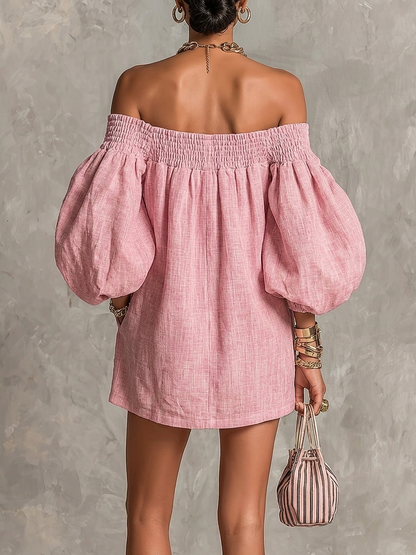 Livia - Miniabito rosa dalla linea svasata, con spalle scoperte e maniche a palloncino