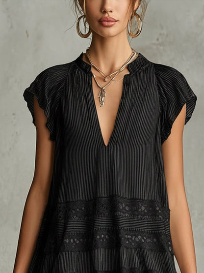 Fiorella - Miniabito a balze in chiffon a righe nere con rifiniture in pizzo