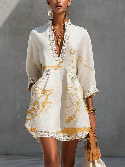 Rachele - Miniabito Elegante con Scollo a V e Dettagli Artistici Dorati
